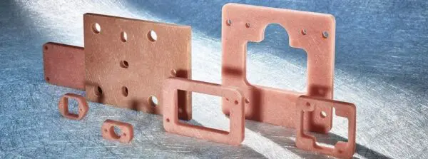 A close up of some pink plastic parts