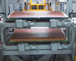 Two machines are shown with a wooden surface.