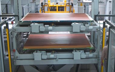 Two machines are shown with a wooden surface.
