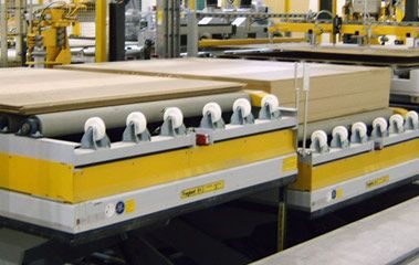 A conveyer belt with many boxes on it