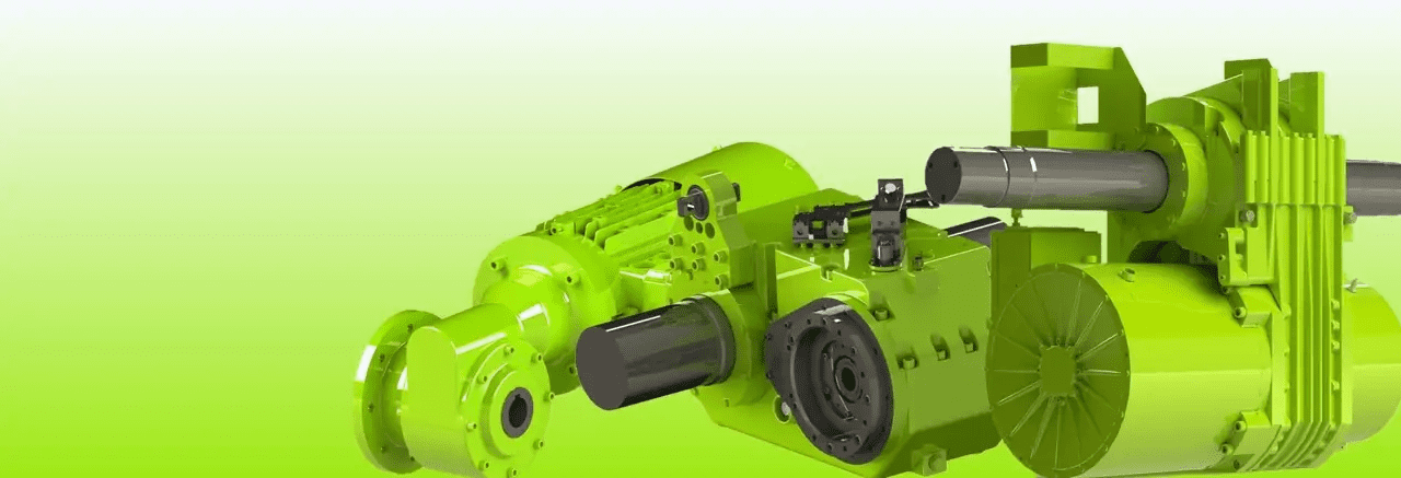 A green machine with a large motor and gear.
